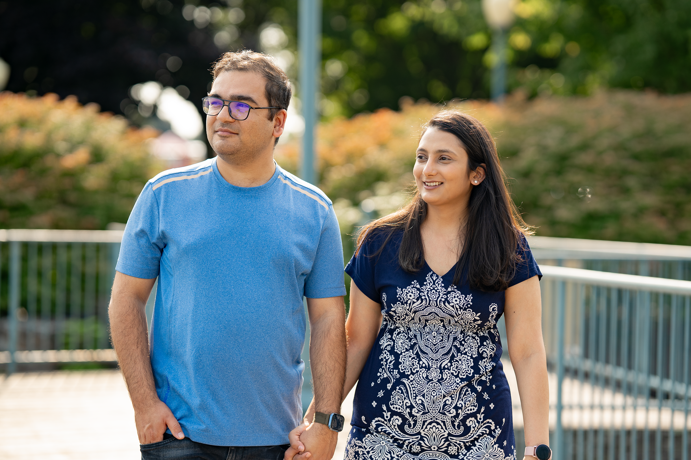 Shivali and her husband walking in the park in Brockville.